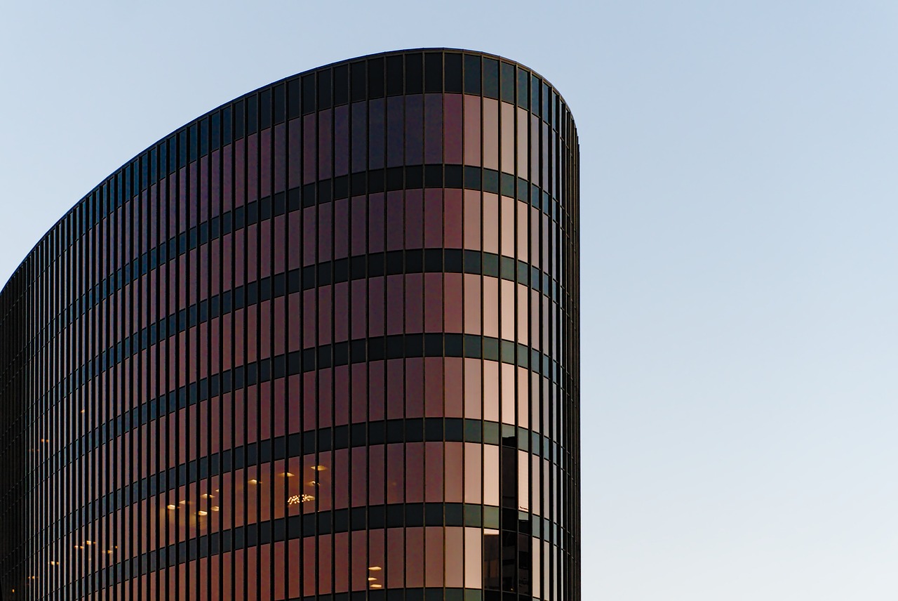 Building, architecture, modern building — Can Getting Paid to Learn Code Really Help You Become Successful Professionals?