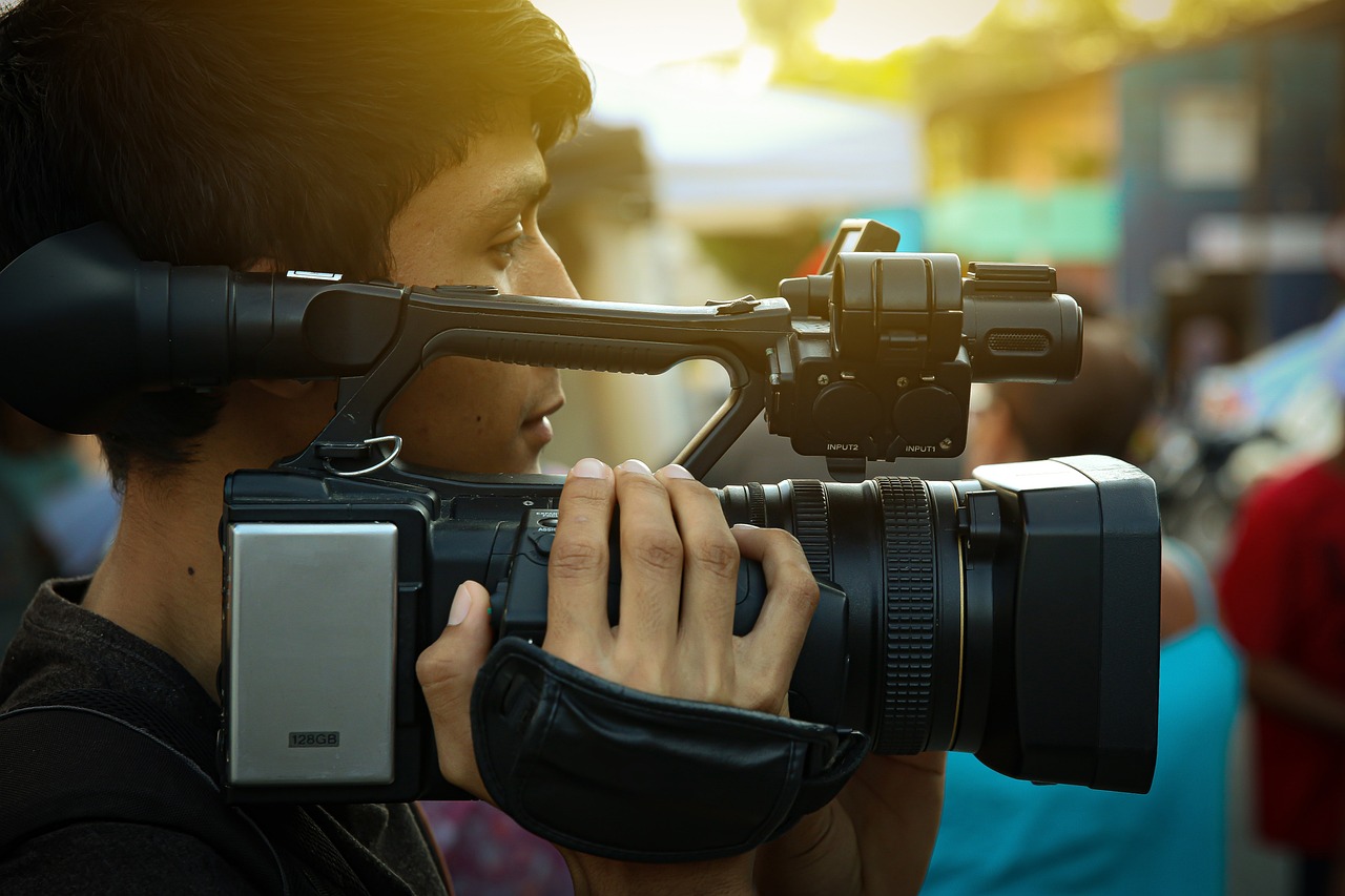 Camcorder, cameraman, video — IPTV channels include sports, kids, movies, and documentaries